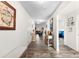 A well-lit foyer with hardwood floors leads to the home's living spaces at 1355 Amberlight Cir, Salisbury, NC 28144