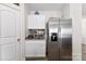 The kitchen features stainless steel appliances, white cabinets, and granite countertops at 1355 Amberlight Cir, Salisbury, NC 28144