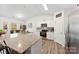 Well-lit kitchen featuring stainless steel appliances and spacious countertops at 1355 Amberlight Cir, Salisbury, NC 28144