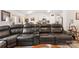 Spacious living room featuring a comfortable, oversized leather sectional sofa at 1355 Amberlight Cir, Salisbury, NC 28144