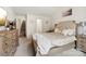 Relaxing main bedroom featuring neutral tones, soft carpet, decorative wall art, and a king-size bed at 1355 Amberlight Cir, Salisbury, NC 28144