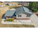 Aerial view of a split-level home with brick and siding exterior, and a long driveway at 1401 Southwest Blvd, Newton, NC 28658