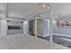 Basement featuring gray carpet, black tiles, pillars, and an aquarium at 1401 Southwest Blvd, Newton, NC 28658