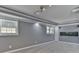 Basement featuring two windows, gray carpet, and an aquarium at 1401 Southwest Blvd, Newton, NC 28658