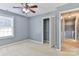 A serene bedroom with neutral walls, soft carpet, and a window offering plenty of natural light at 1401 Southwest Blvd, Newton, NC 28658