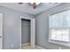 Bedroom featuring an open closet and a window for natural light at 1401 Southwest Blvd, Newton, NC 28658