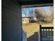 View of backyard from deck; grassy area and detached structure at 1440 Rhodes Rhyne Rd, Lincolnton, NC 28092