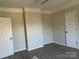 Bedroom with vinyl flooring and double-door closet at 1440 Rhodes Rhyne Rd, Lincolnton, NC 28092