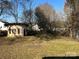 Backyard view with unique structure at 1440 Rhodes Rhyne Rd, Lincolnton, NC 28092