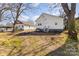 A view of the backyard with two white houses in the background at 1712 S Main St, Salisbury, NC 28144