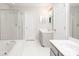 Bathroom with dual vanity, soaking tub, and walk-in shower at 172 Foxtail Dr, Mooresville, NC 28117