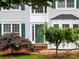 Close-up of the front entrance, highlighting the door and landscaping details at 172 Foxtail Dr, Mooresville, NC 28117