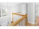 Staircase with wood handrail leads to the upper level of the home at 172 Foxtail Dr, Mooresville, NC 28117