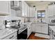 Bright kitchen showcasing stainless steel appliances, white subway tile backsplash, and marble countertops at 200 Staffordshire Dr, Statesville, NC 28625