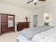 Spacious main bedroom with carpet, wood furniture and decor, with a view to the bathroom at 200 Staffordshire Dr, Statesville, NC 28625