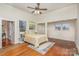 Bright bedroom with hardwood floors, ceiling fan and access to office at 202 W Main St, Cherryville, NC 28021