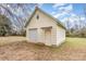 Detached garage with single door and overhead door at 202 W Main St, Cherryville, NC 28021