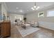 Inviting living room with hardwood floors, neutral colors, modern furniture, and bright lighting at 250 Cherry Tree Dr, Fort Mill, SC 29715