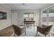 Home office features hardwood flooring, neutral paint, and lots of natural light from multiple windows at 250 Cherry Tree Dr, Fort Mill, SC 29715