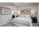 Main bedroom with neutral decor and en-suite bathroom at 2533 Ellen Ave # 1016B, Charlotte, NC 28208