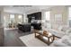 Open concept living room and kitchen with hardwood floors and neutral decor at 2537 Ellen Ave # 1016C, Charlotte, NC 28208