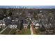 Aerial view of the house and neighborhood with city skyline in the background at 258 Fenton Pl, Charlotte, NC 28207