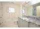 Elegant bathroom with grey marble vanity and walk-in shower at 258 Fenton Pl, Charlotte, NC 28207