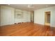 Bright bedroom with hardwood floors, built-in shelving and access to bath at 258 Fenton Pl, Charlotte, NC 28207