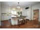 Spacious kitchen with island, stainless steel appliances, and ample cabinetry at 258 Fenton Pl, Charlotte, NC 28207