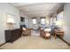 Living room with hardwood floors, fireplace, and large windows at 258 Fenton Pl, Charlotte, NC 28207