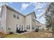 Backyard patio featuring double doors leading into the home at 2604 Cochrane Dr, Charlotte, NC 28269