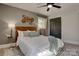 Serene bedroom featuring a decorative headboard, closet, and soft, natural light at 2624 Ashley Rd, Charlotte, NC 28208