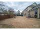 Large backyard with a playset and partial view of house at 2748 Smethwick Ln, Gastonia, NC 28056