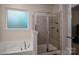 Bathroom with shower stall and separate bathtub at 2748 Smethwick Ln, Gastonia, NC 28056