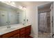 Double vanity bathroom with shower/tub combo at 2748 Smethwick Ln, Gastonia, NC 28056