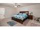 King-size bedroom with ensuite bathroom and sitting area at 2748 Smethwick Ln, Gastonia, NC 28056