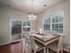 Bright dining area with sliding door access to the patio at 2748 Smethwick Ln, Gastonia, NC 28056