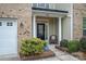 Inviting front entrance with black door and columns at 2748 Smethwick Ln, Gastonia, NC 28056