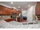 Granite countertops and stainless steel appliances in this kitchen at 2748 Smethwick Ln, Gastonia, NC 28056