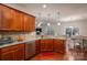 Updated kitchen, featuring granite countertops and wood cabinets at 2748 Smethwick Ln, Gastonia, NC 28056