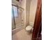 Small bathroom with shower/tub combo and toilet at 29086 Sweet Home Church Rd, Albemarle, NC 28001