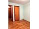 Simple bedroom with hardwood floors at 29086 Sweet Home Church Rd, Albemarle, NC 28001