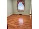 Bright bedroom with hardwood floors and window at 29086 Sweet Home Church Rd, Albemarle, NC 28001