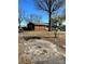 Brick ranch home with a gravel driveway at 29086 Sweet Home Church Rd, Albemarle, NC 28001