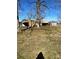 Tan metal carport and attached shed at 29086 Sweet Home Church Rd, Albemarle, NC 28001