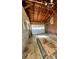 Large garage with high ceilings and exposed beams at 29086 Sweet Home Church Rd, Albemarle, NC 28001