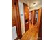 Hallway with wood floors and built-in storage at 29086 Sweet Home Church Rd, Albemarle, NC 28001