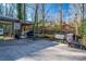 Relaxing backyard patio featuring a pergola and grill at 303 Edgewood Rd, Shelby, NC 28150