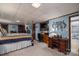 Spacious basement bedroom with a desk and ensuite bathroom access at 303 Edgewood Rd, Shelby, NC 28150