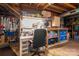 Organized basement workshop area with workbench and storage shelving at 303 Edgewood Rd, Shelby, NC 28150